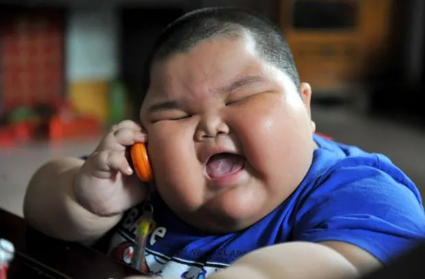 A chunky asian kid. No offense intended, just a mere description.
