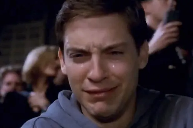 Peter Parker from Spiderman crying