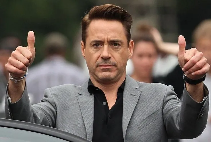 Robert Downey Jr. doing an ok sign with his hands
