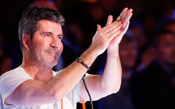 Simon Cowell clapping