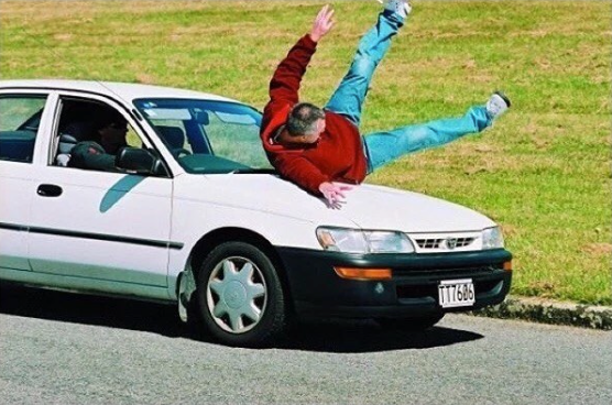 A man being hit by a car