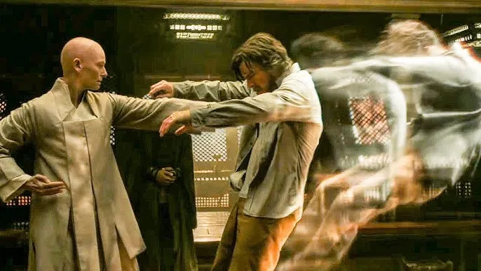 Dr. Strange's astral body being pushed out of his physical body by the Ancient One