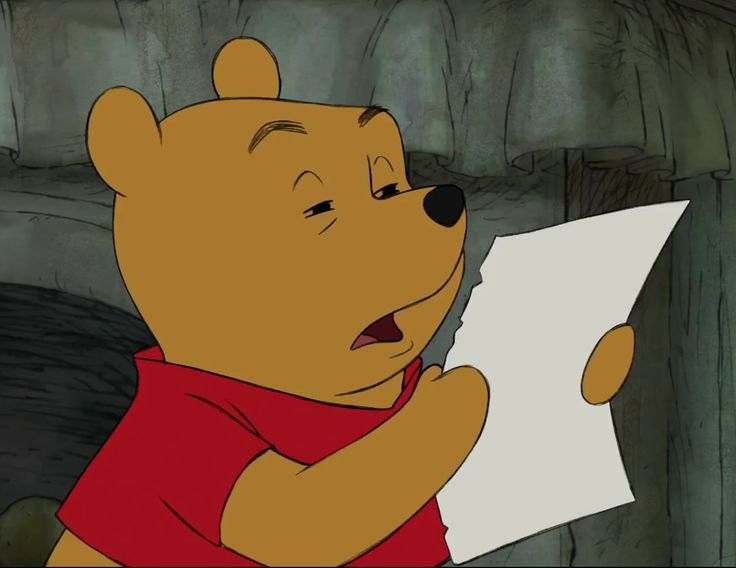 Winnie the Pooh squinting at a piece of paper