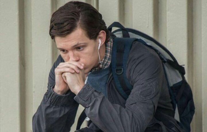 Tom Holland in a deep thinking pose